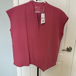 New With Tags.  Pink Rafaela scrub top.  Technical collection size medium.